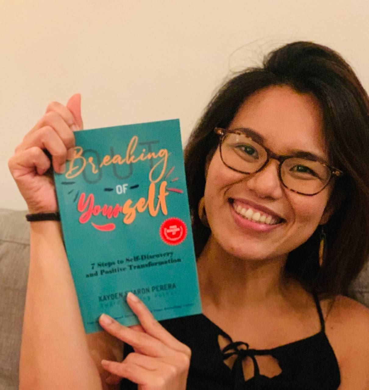 Reader holding Breaking Out of Yourself